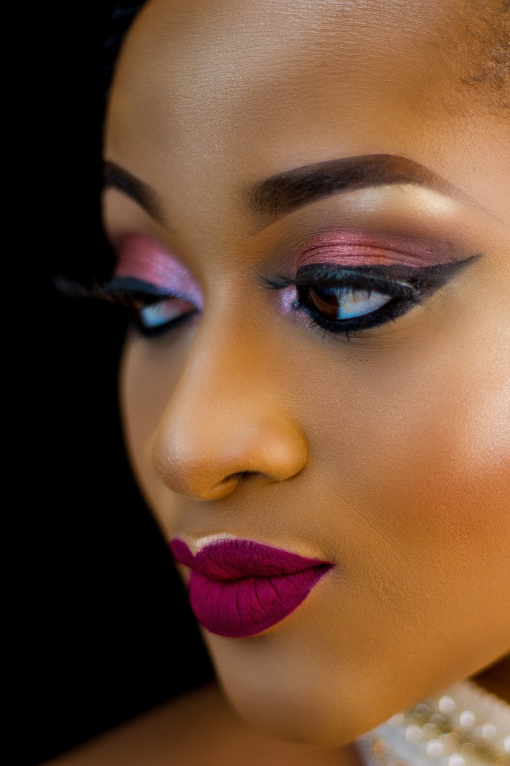 Close-up Photo of Beautiful Woman in Make-up Looking Away